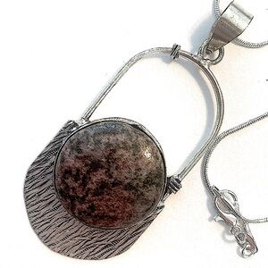 2 1/2 inch, 925 marked, Rhodonite gemstone pendant on a silver chain.